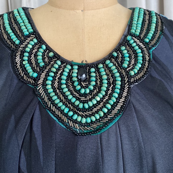 Beautiful dress, tunic even good for pregnancy a polyester and spandex. - Picture 6 of 9